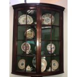 A Georgian glazed corner cupboard with original glass.