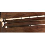 Two maritime walking sticks and a silver mounted baton/pointer by Adolph Frankham