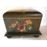 A 19thC papier-mâché floral painted tea caddy, 18cms x 11cms x 13cms h