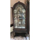 Mahogany display cabinet with single glazed door over drawer with arched pediment.