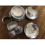 A quantity of silver items to include cruet, pin tray, napkin ring and two flower shaped dishes