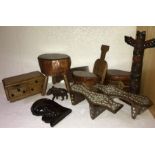 A quantity of unusual wooden items to include 'magic' money box, carved wild boar etc... (11)