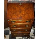 A good quality burr walnut bureau with well fitted interior. 97cm h x 52 w x 47 d