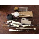 Miscellany to include bone handled button hooks, map measurer, compass etc.