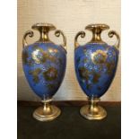 A pair of mid 19thC gilt and blue vases, slight rubbing to gilt. Approx 31 cms h
