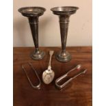Two silver vases 23 cms h, two Scottish silver sugar bows and a silver table spoon