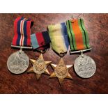 Four WW II medals inc. the Atlantic Star