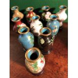 Ten miniature cloissoné vases on stands
