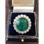 Cabachon cut emerald and diamond cluster ring