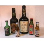 Various bottles of alcohol including Coronation Ale June 22nd 1911, vintage 1996 Christmas Ale and 4