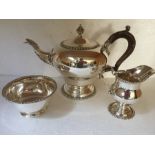 A three piece silver tea service by CS Harris & Sons Ltd, London. 36.29 toz total, Teapot - 1929,