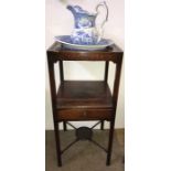 A washstand complete with jug and bowl