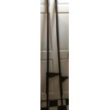 A pair of stilts with adjustable footrests - 177 cms l