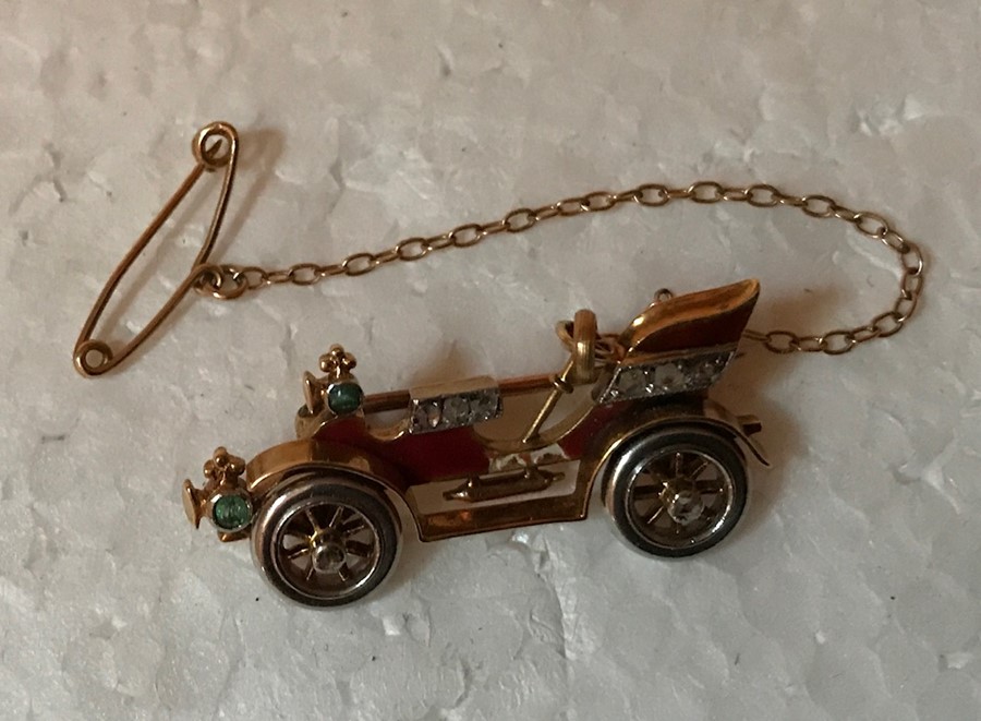 Yellow metal gem set and enamel brooch in the form of a vintage car .Slight a/f to enamel. Marked to - Image 4 of 4