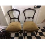 A pair of 19thC walnut salon chairs