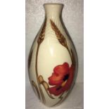 A Moorcroft harvest poppy pattern vase - 24cms h - marked to base 2000.