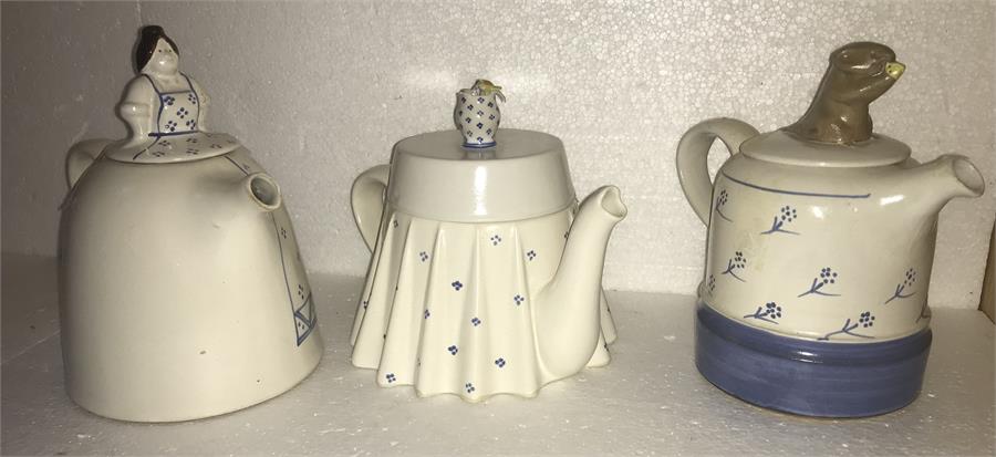 Three various teapots by J&G Morten depicting mouse eating cheese, table with flowers (damage to