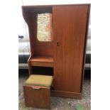 A 1970’s Teak veneered hall cupboard with pullout stool