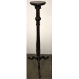 A mahogany torchere - 118cms h