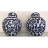 Two blue and white oriental lidded jars - 27cms h