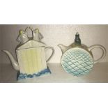 Two novelty teapots, one depicting angels on top of pearly gates by J&G Morten