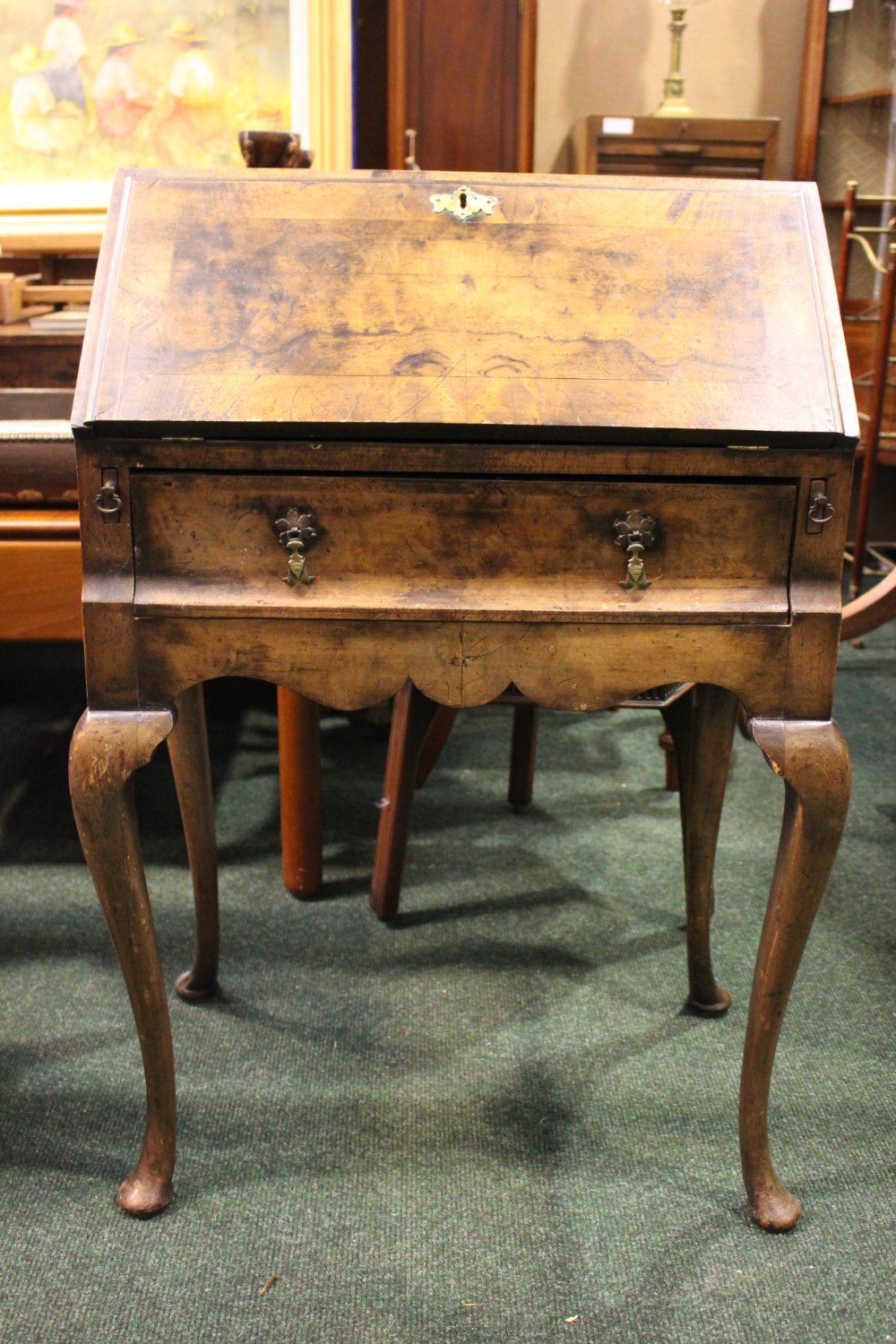 A FINE WALNUT BUREAU DU JOUR, neat size, drop down front reveals cabinet with drawers, over a single