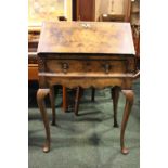 A FINE WALNUT BUREAU DU JOUR, neat size, drop down front reveals cabinet with drawers, over a single