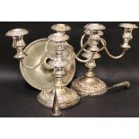 A PAIR OF VERY FINE SILVER PLATED TABLE TOP CANDELEBRA CANDLESTICKS, decorated with chasing