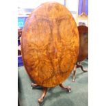 A LATE 19TH CENTURY OVAL WALNUT TIP-UP “LOO TABLE”/BREAKFAST TABLE
