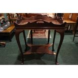 A MAHOGANY "BUTLERS" TABLE, with removable tray on top, the tray has a shaped raised rim
