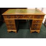 A 20TH CENTURY PEDESTAL DESK, with green leather top, 3 frieze drawers, over 6 pedestal drawers (3&