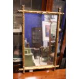 A GILT WOOD MIRROR