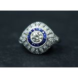 AN 18CT WHITE GOLD SAPPHIRE & DIAMOND "BOMBAY" RING