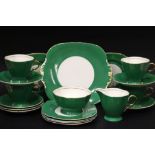 A TEA SET FOR FOUR, includes; (4) cups, (6) saucers, (6) plates, (1) sugar bowl (1) jug