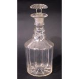 AN IRISH, 19TH CENTURY, 3 RING NECK DECANTER, with stopper, starburst base, with wide fluted body
