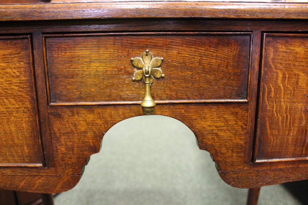 A FINE OAK THREE DRAWER LOWBOY/DESK, with 2 deep drawers flanking a central narrow drawer - Image 2 of 3