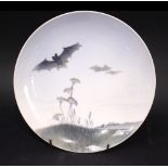 A ROYAL COPENHAGEN “BATS IN FLIGHT” PLATE, early 20th Century, with stamp verso