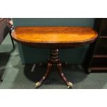 A VERY FINE REGENCY MAHOGANY FOLD OVER TEA TABLE, rounded cross banded top, raised on turned brass