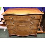 A FINE SERPENTINE SHAPED CHEST OF DRAWERS, with 4 graduated drawers, each with swan neck brass