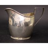A VERY EARLY 19TH CENTURY SILVER JUG Sheffield ware, date letter crown over M for 1802/03, with lion
