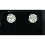 A PAIR OF 18CT WHITE GOLD DIAMOND CLUSTER EARRINGS