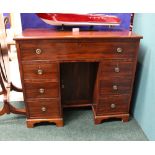 A TALL KNEE HOLE DESK, with a single drawer over two pairs of 3, and a recess cabinet to the centre,