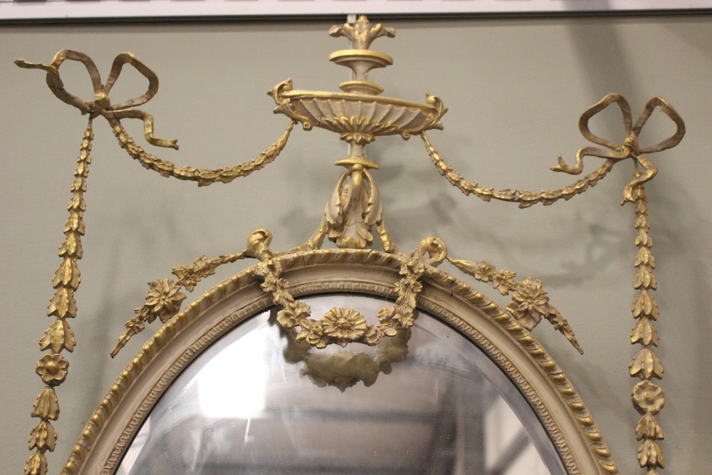 AN OVAL GILT WALL MIRROR, with floral & foliage gesso detailing, bevelled glass - Image 3 of 3