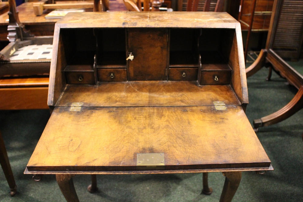 A FINE WALNUT BUREAU DU JOUR, neat size, drop down front reveals cabinet with drawers, over a single - Image 4 of 4