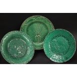 A COLLECTION OF 20 MAJOLICA GREEN CABBAGE LEAF PLATES, various designs