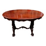 A VERY FINE 19TH CENTURY OVAL SHAPED LIBRARY TABLE, with scalloped apron, and down turned finial