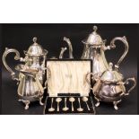 A VERY FINE SILVER PLATED TEA SET, includes; (1) tea pot, (1) coffee pot, (1) sugar bowl, (1)