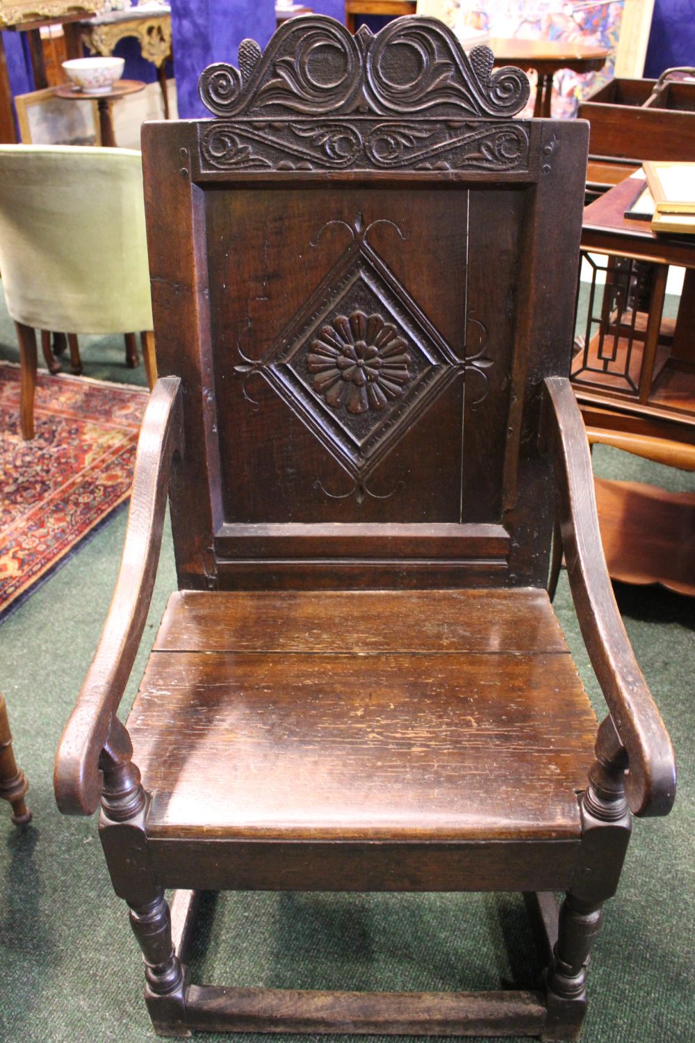 AN OAK “WAINSCOT” ARMCHAIR, with square panel back, having carved top rail, and lozenge shaped - Image 3 of 4