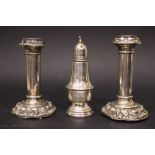 A MIXED LOT OF SILVER; includes; (2) A pair of small candlesticks, Birmingham, date letter for