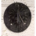 A CONTEMPORARY ORNAMENTAL SUN DIAL, engraved with the words, "Turn your face to the sun, and the